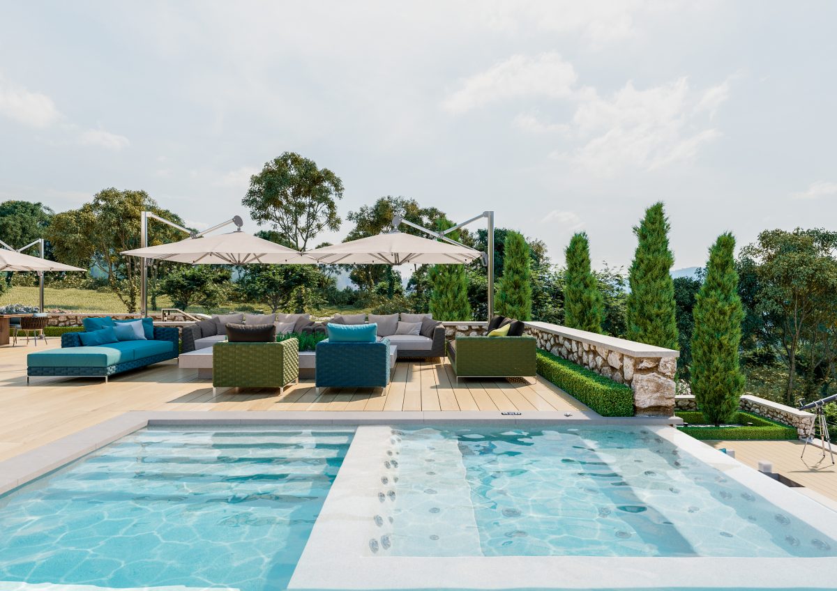 gunite-pool-example-witmediterranean-villa-interior-and-exterior-design-2024-09-19-00-57-15-utc Modern outdoor patio with a swimming pool—explore Fiberglass vs. Concrete vs. Vinyl options—plus sun loungers, sofas, umbrellas, and lush greenery in the background under a partly cloudy sky.